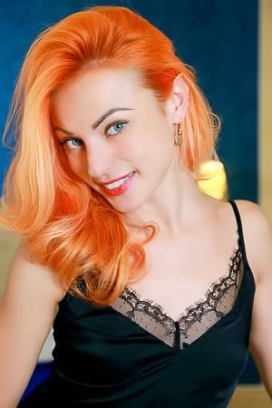 Petite pixie with orange hair