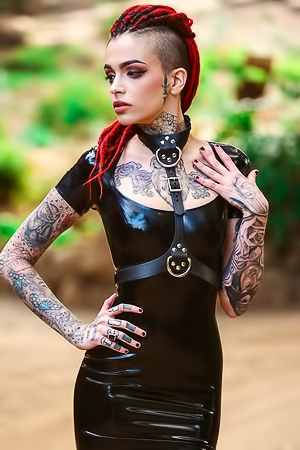 Tattooed Girl In Black Latex Dress