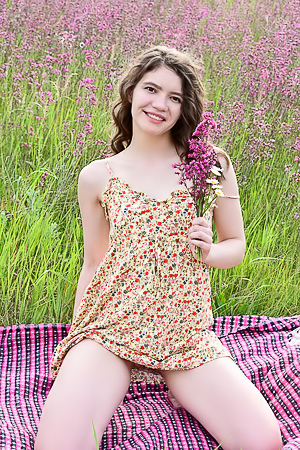 Carrie Rides Up To Expose Her Sexy Booty When She Stretches Out On A Blanket