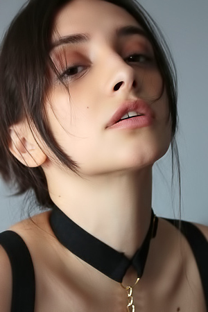 Olivia Linz Her Passionate Gaze Conveying Her Erotic Thoughts