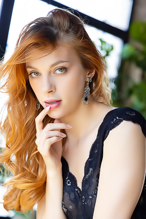 Naty Evans Entices In Revealing Striptease Showcasing Lustful Curves