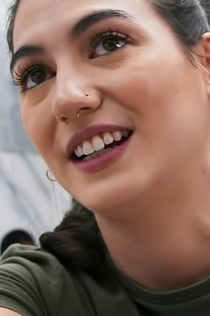 Evening Sun Casts Glow As Megan Mistakes Teases Her Tattooed Partner
